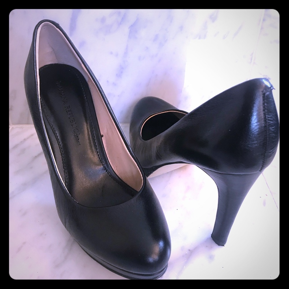 Black leather pumps
